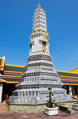 Bangkok, Thailand Wat Pho Temple Of The Reclining Buddha. White stupa. In honor of Rama II built a white stupa. In stupas relics and 4 large stupas relics of the Buddha.