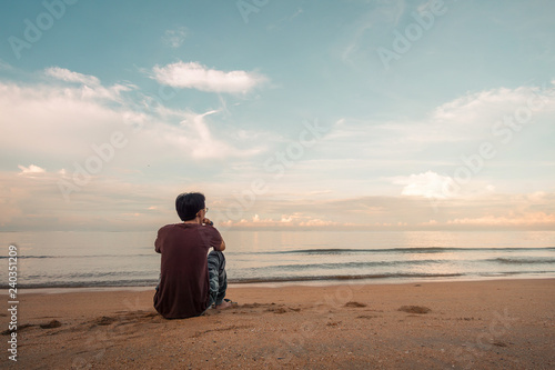 Lonely Asian Man Sitting Watching Sunset Alone On Beach Buy This Stock Photo And Explore Similar Images At Adobe Stock Adobe Stock
