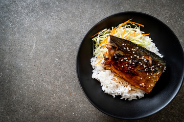 saba fish grilled with teriyaki sauce on topped rice bowl