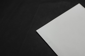 White envelope on black background.