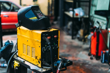 Used welding mask and welding mig machine with garage on back