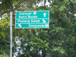 Road sign showing directions to Gianyar, Padang Galak , Batu Bulan and Denpasar