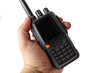 © malcev852 - male hand holding a walkie talkie on a white background. Isolate