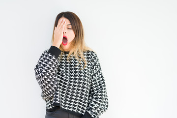 Canvas Print - Young woman wearing casual sweater over isolated background Yawning tired covering half face, eye and mouth with hand. Face hurts in pain.