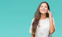 Young Beautiful Arab Woman Talking On The Phone Over Isolated Background With A Happy Face Standing And Smiling With A Confident Smile Showing Teeth