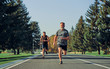© realstock1 - The two sportsmen running on the road
