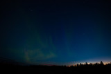 Fototapeta Tęcza - Northern lights detail view from Iceland. Green aurora