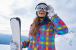 © ZoomTeam - Portrait of woman in ski outfit. Portrait of cheerful blond woman at ski resort