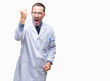 © Krakenimages.com - Middle age senior hoary professional man wearing white coat over isolated background angry and mad raising fist frustrated and furious while shouting with anger. Rage and aggressive concept.