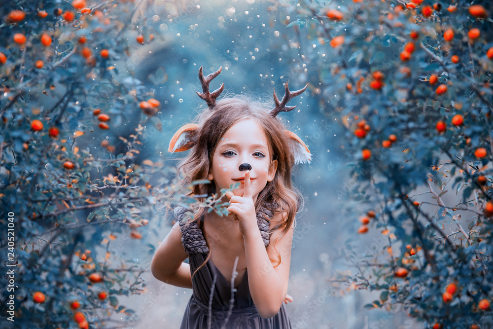 spirit of the forest in the form of a child in a light brown dress, a baby deer playfully leads into the forest, the little faun keeps the secret and hides in the berry bushes, the winter cold colors
