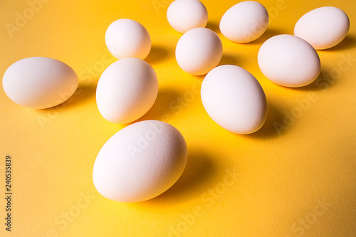 Fotografie, Obraz eggs pattern over yellow pastel background. Front view--.
