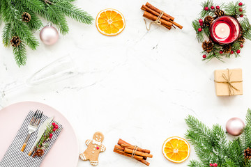 Christmas table setting with gift box and fir tree white background top view mockup