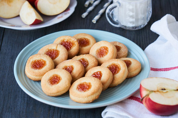 Wall Mural - Homemade shortbread with apple jam on a blue plate 