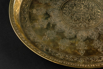 Wall Mural - close-up of the tray with Eastern engraving