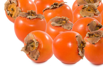 Wall Mural - isolated image of a persimmon close up