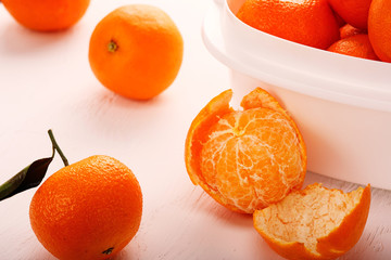 fresh ripe tangarines, food closeup on white background.