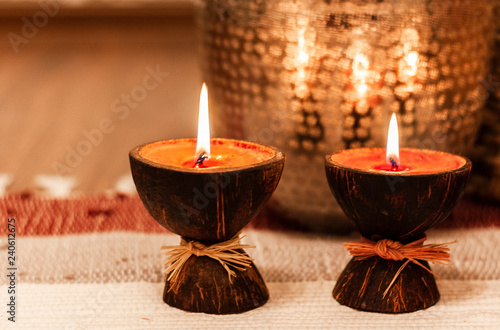 Cozy Home Interior Decor Burning Candles On A Multi Colored Rug On The Background Of A Metal Vase Image Buy This Stock Photo And Explore Similar Images At Adobe Stock