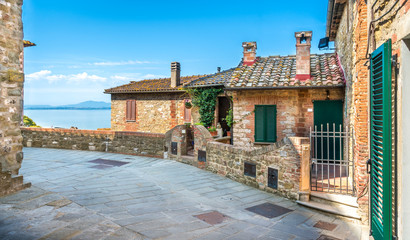 Wall Mural - Passignano sul Trasimeno, idyllic village  overlooking the Trasimeno Lake. Umbria, Italy.