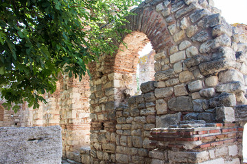 Wall Mural - Ruins of an ancient temple complex in Nessebar. Old church ruin in Nessebar, ancient city on the Black Sea coast of Bulgaria.