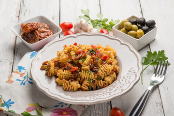 Canvas Print - pasta with dried tomatoes fresh tomaoes and green olives