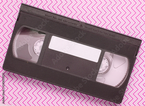 Cuadros en Lienzo Video cassette on blue creative background, media 80s. Top view..