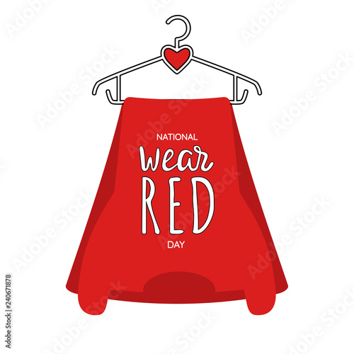 Fotografía National Wear Red Day text on red dress, hanging on hanger with heart in the middle of it