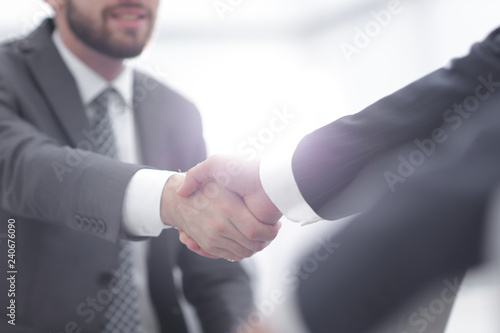 Fotografie, Obraz Two colleagues shaking hands after a business meeting