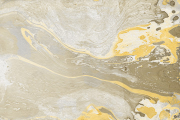 Luxury gold marble ink paper texture on dark watercolor background. Chaotic abstract organic design. Bath bomb waves.