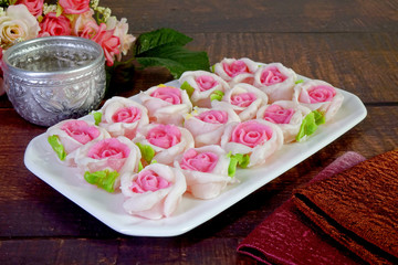 Sticker - Rose candy : Siamese Allure rose candy, famous Royal Thai cuisine. Made from coconut milk, wheat flour and sugar. Colorful roses shaped candy from Thailand, gift for Valentine's day and New year.