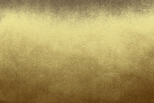 Luxury Gold Textile Background. Silk Cloth Texture. Fabric Pattern.