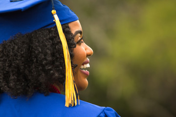 Portriat of a young African American Woman at graduation.