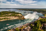 Fototapeta Nowy Jork - Niagara Falls, Canada. Aerial panoramic view of Niagara Horseshoe Falls, the Canadian side of Niagara Falls, boats and upper Niagara river.