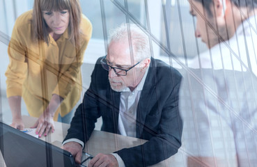 Wall Mural - Business people working together, double exposure