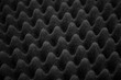 Texture soundproof panel of polyurethane foam. Abstract black rubber foam background.
