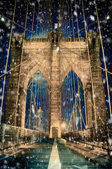Fototapete - Brooklyn Bridge New York City with snowflakes falling during winter snow storm
