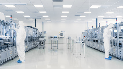 Wall Mural - Scientists Working in Laboratory. Facility with Modern Industrial Machinery. Product Manufacturing Process: Pharmaceutics, Semiconductors, Biotechnology.