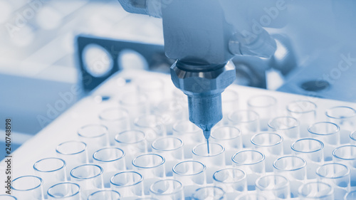 Cuadros en Lienzo Close-up Shot of the Industrial Manufacturing Medical Test Tubes, Process of Sterilising and Filling