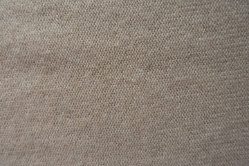 Wall Mural - View of beige knitted fabric made with reverse stockinette stitch from above