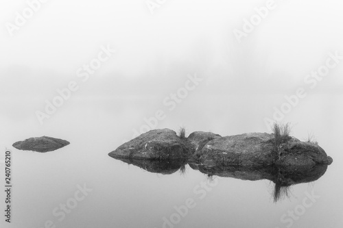 Fotografía Landscape with fog in the natural park of the Barruecos