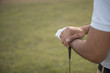 © reewungjunerr - The golfer holding the golf club at the golf course,Thailand people