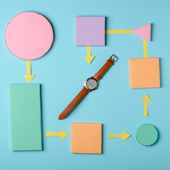 Wall Mural - Colorful paper blocks and watch