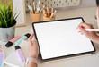 © bongkarn - Graphic designer hand using digital tablet pen in studio