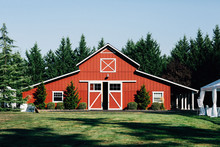 Large Red Barn During Day