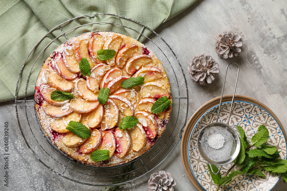 Tasty apple pie on grey table
