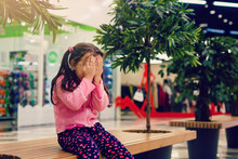 Adorable Little Girl Is Crying In The Mall