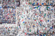 Stacked piles of plastic bottles for recycling, waste management concept