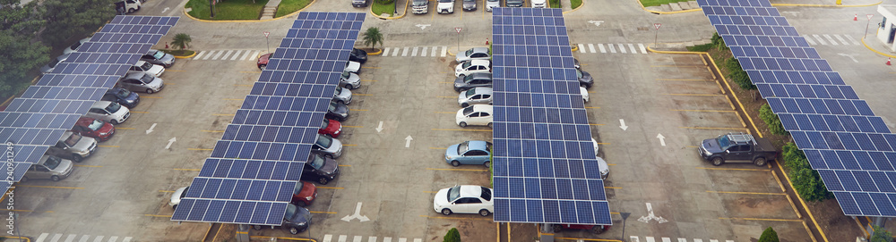 Parking lot with solar panel on roof - obrazy, fototapety, plakaty 