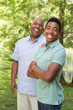 © digitalskillet1 - African American father talking to his teen son.