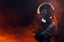 Biker Woman With Helmet And Leather Outfit Portrait