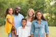 © digitalskillet1 - Portrait of a multi ethnic family laughing.